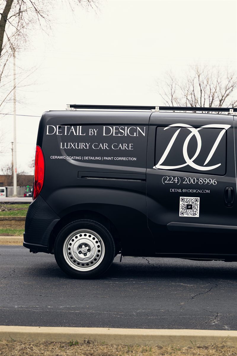 The Detail By Design branded mobile detailing van.