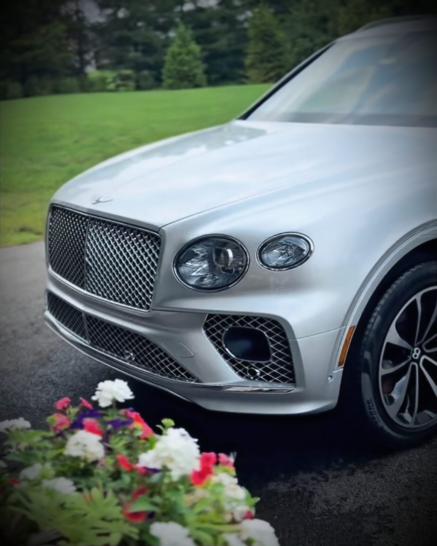 A silver Bentley Bentayga with a flawless, freshly detailed finish.